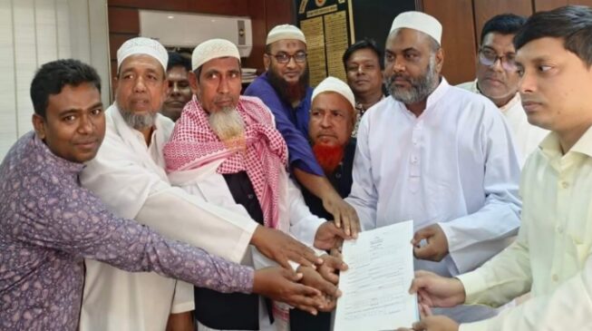 বাগমারায় আ’লীগের দলীয় এমপি প্রার্থী আবুল কালামের মনোনয়ন ফরম উত্তোলন