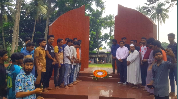 পুঠিয়ায় কোটা আন্দোলনে নিহত শহীদদের স্মরণে পুষ্পস্তবক অর্পণ ও দোয়া